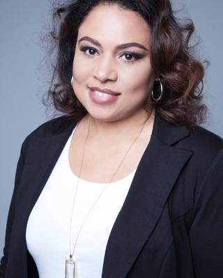 A headshot of Ayanna Cooper